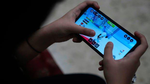 Police keep warning parents about Roblox. So why isn't it in the social media bill?: Police in Canada keep warning parents about the dangers of gaming and messaging platforms like Discord and Roblox. But neither will be covered by the government’s proposed Safe Social Media Act. Even supporters of the legislation say it's an alarming omission. #Roblox #GamingSafety #SocialMedia #Parenting #DigitalWellbeing 1 4e9cc240865d9faf6e40993d44dccc170db334a3