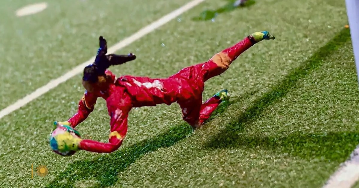 Soccer art made from gum wrappers: Artist Lyndon J. Barrois Sr. painstakingly sculpts art depicting soccer players. His medium of choice? The humble chewing gum wrapper. Correspondent Luke Burbank talks with Barrois about his Los Angeles exhibit, “Fútbol Is Life: Animated Sportraits,” which captures iconic moments from nearly 100 years of the World Cup in tiny pieces of paper and foil. #SoccerArt #GumWrapperArt #FutbolIsLife #LyndonBarrois #WorldCup