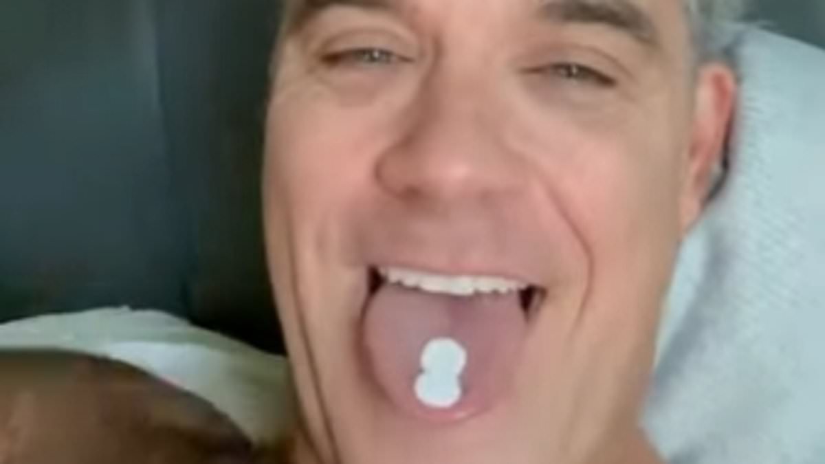 Robbie Williams pokes fun at viral World Cup moment after fans saw 'white substance falling on microphone' live on TV: Robbie Williams has poked fun at his World Cup interview after it went viral when fans suspected something white had fallen from his nostrils. #RobbieWilliams #WorldCup #ViralVideo #Comedy #PopCulture 1 fe12ab54fbd8b3d9ef0d9750f2fb307f7dad4083