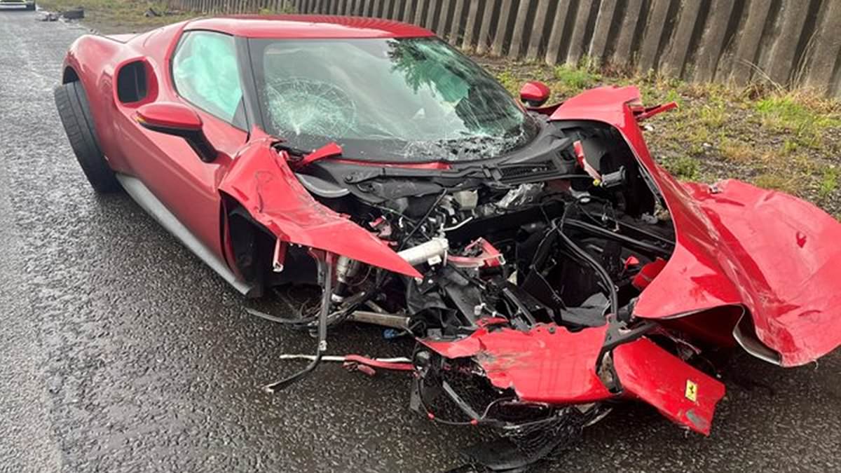 Ferrari supercar is wrecked after driver 'lost control' on motorway... but miraculously escapes unharmed 1 4c47025e922aa64e8ca9bcfbdc20f9240dc6d20396018006bfd6f33596b40ed5
