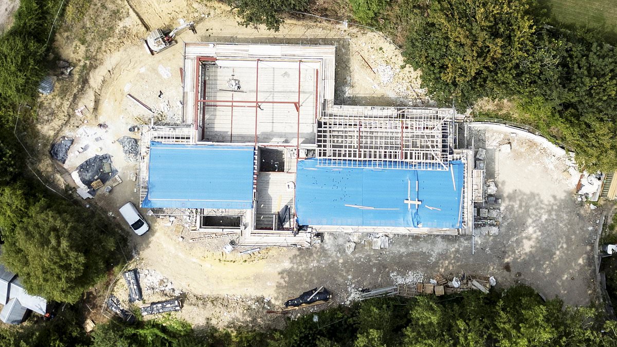 Millionaire's 'monstrous' mega mansion 'must be torn down': Neighbours demand 'city's biggest newbuild in 100 years' is torn down after being built without permission 1 b1bda94598307821b7efe6697df2f5d1c689cf17ba53a38e2dee67209ad27cb4