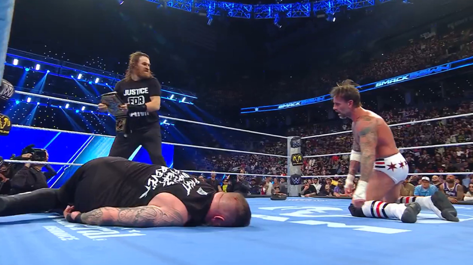 CM Punk Retains WWE Title Over Kevin Owens After Sami Zayn Interferes On SmackDown 1 f52273019178a0b0ae5dc7ac0f9bd58c5e04c15eead44fc9b97f06938e350bc7