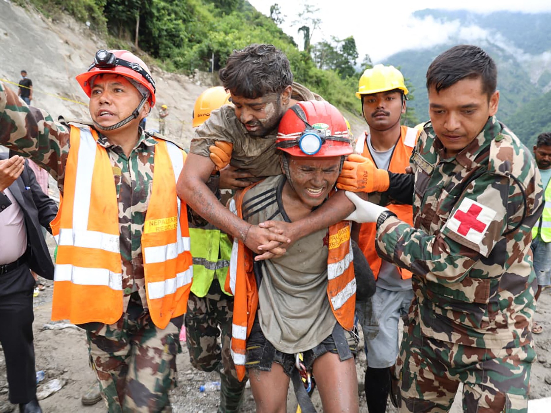 Nepal search teams rescue two workers from hydropower tunnel 1 3545b286005a23608c594bea4c63d27beef1b51fdf72056c7ec09d2051a5041a
