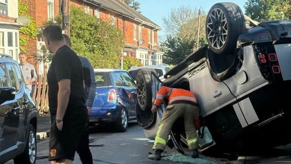 Premier League star flips car on its roof in residential street: Hull City's new £10m signing in crash in his Land Rover Defender while on the way to training 1 3aa3176550ce69c326d0a5ebbc3b8e6b3c19f08fa7bb956b662c7e521dec2146