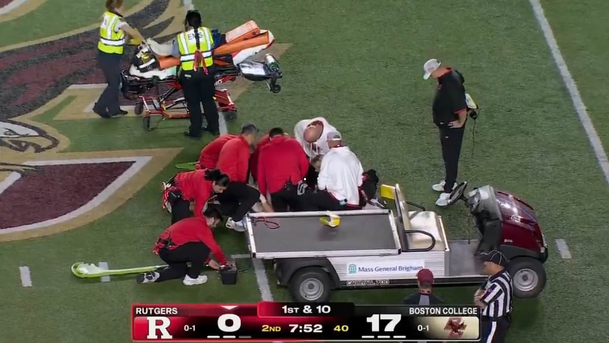College football player left motionless by awkward hit is rushed to Boston hospital in frightening scene 1 559abf68e93b6fa7f9c4e80268184781f9116b7135c4e0e862d1a4a481bb96ac
