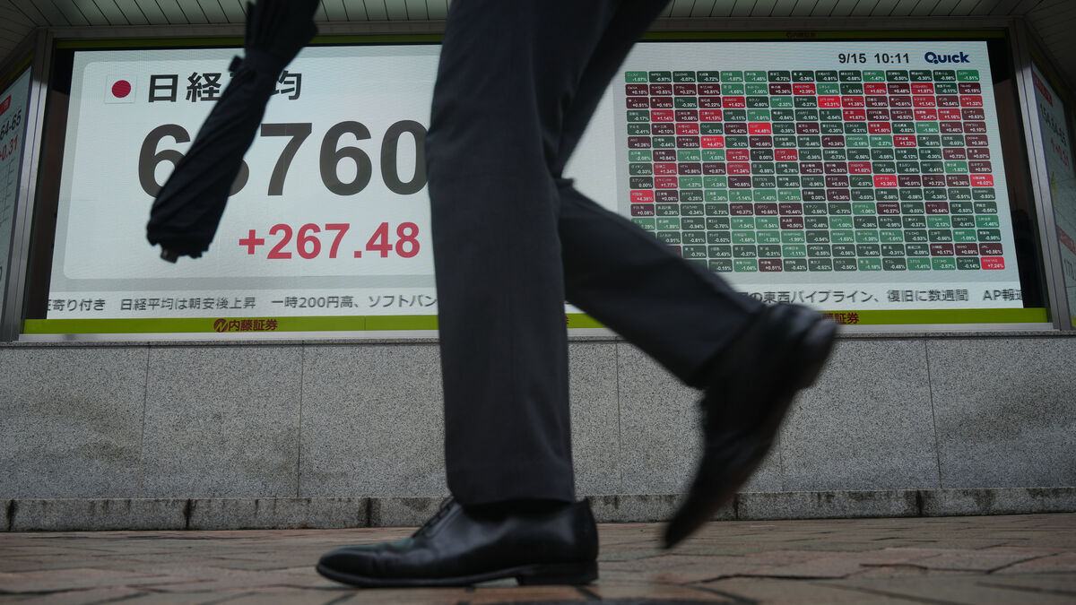 Asian stock markets calm after Fed raises interest rates 1 5c09987cd47b6be737f5ee5f3c3212297c63cd48ea2086d254ae060517b8fe3d