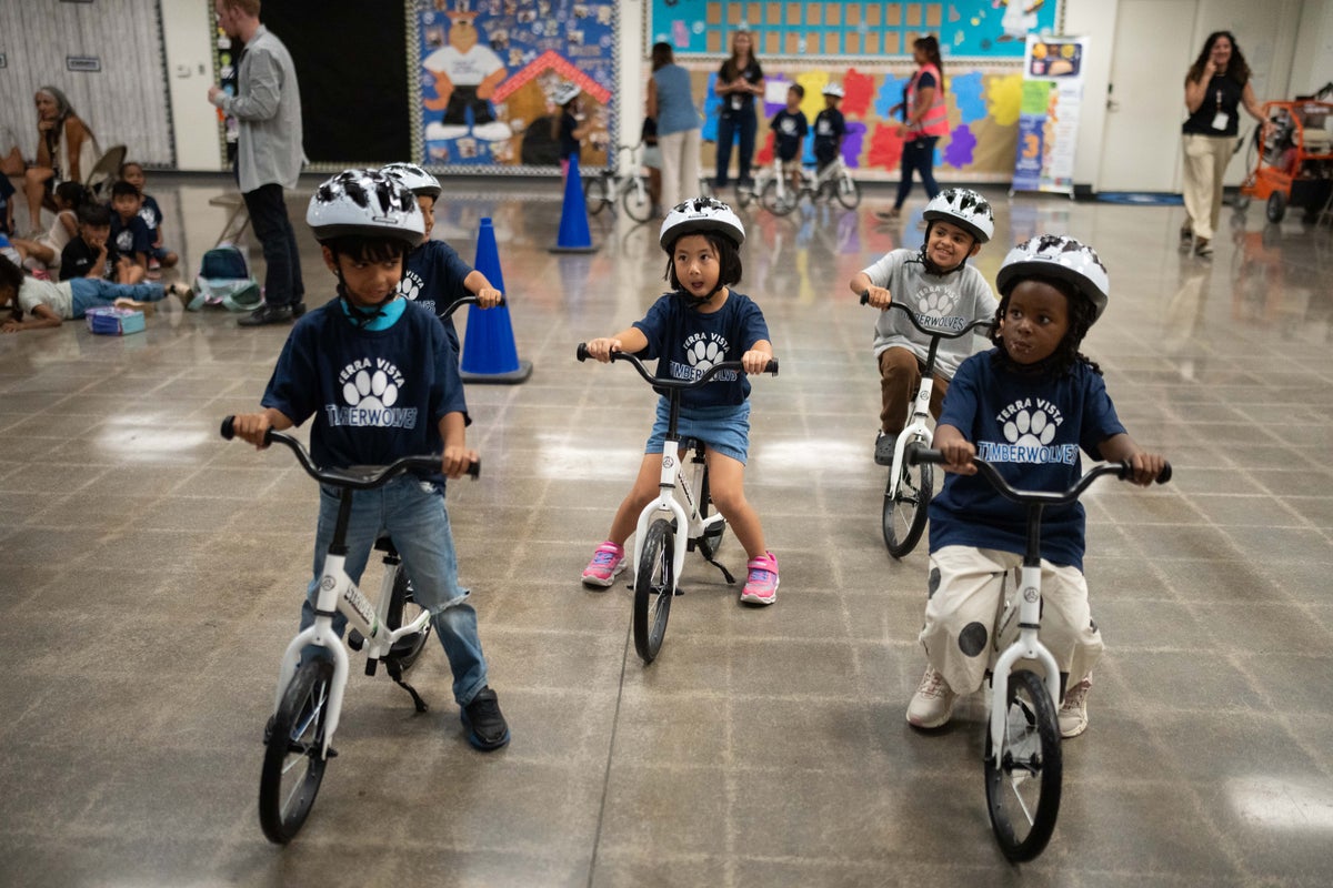 A childhood rite moves indoors as kindergartners learn to ride bikes in school gyms 1 744a6d55ab52c70864aa11b98da20e5cf7045e3f10aa68eb89b7ecb408c5906a