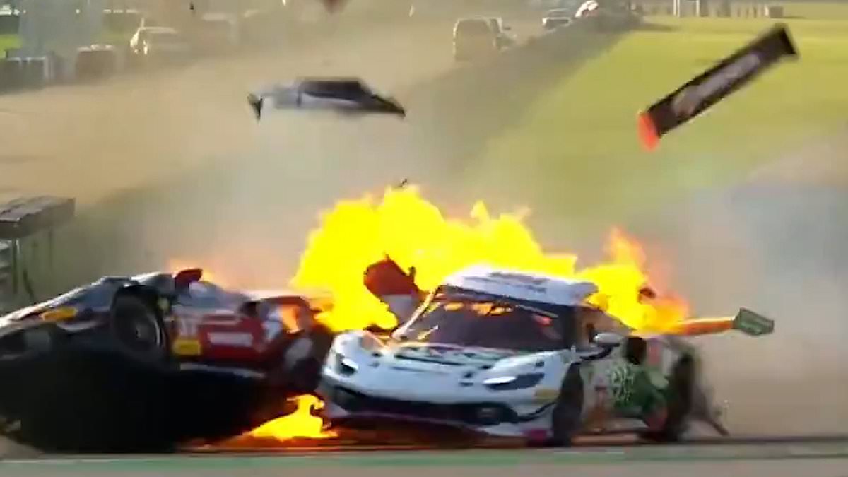 Moment Brit racing driver's Ferrari bursts into flames after smash... before 'superhero' rival rushes towards fireball and saves his life 1 dc6bf4ee2b68d4725a01566a2a80e54e0ef392a8eedfffa878b53b39aa7f69f0