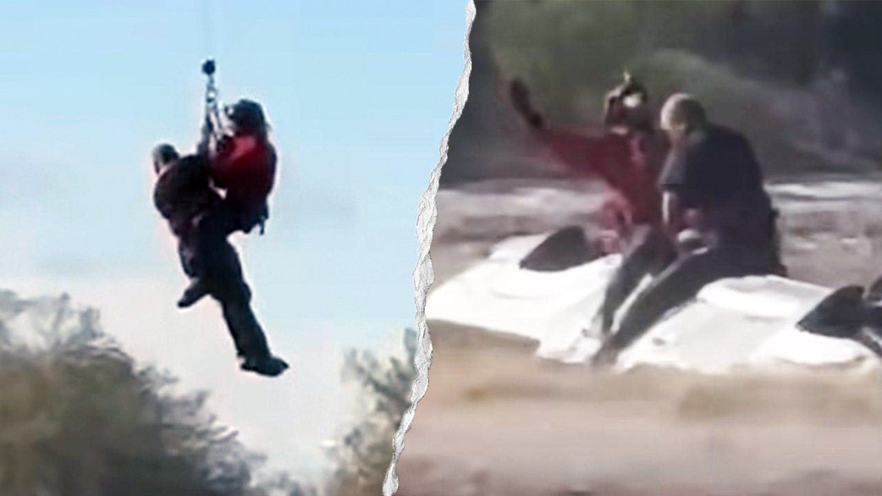 Arizona sheriff's helicopter crew rescues man stranded atop overturned truck in rapidly rising floodwaters 1 7efb4ae3faef3e9d9ebc609a701a2e711ff43e85c0302836b98a7ea1f4a2c8cd