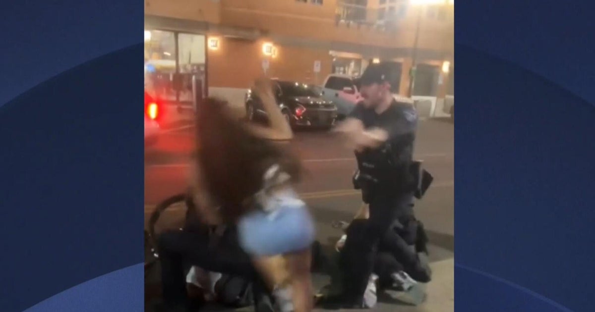 Video shows cheerleader shoved to the ground by police 1 cf0a13e737a9806962c2b5345a2a243cb788aa238a7db4486feefc49bc1fa432