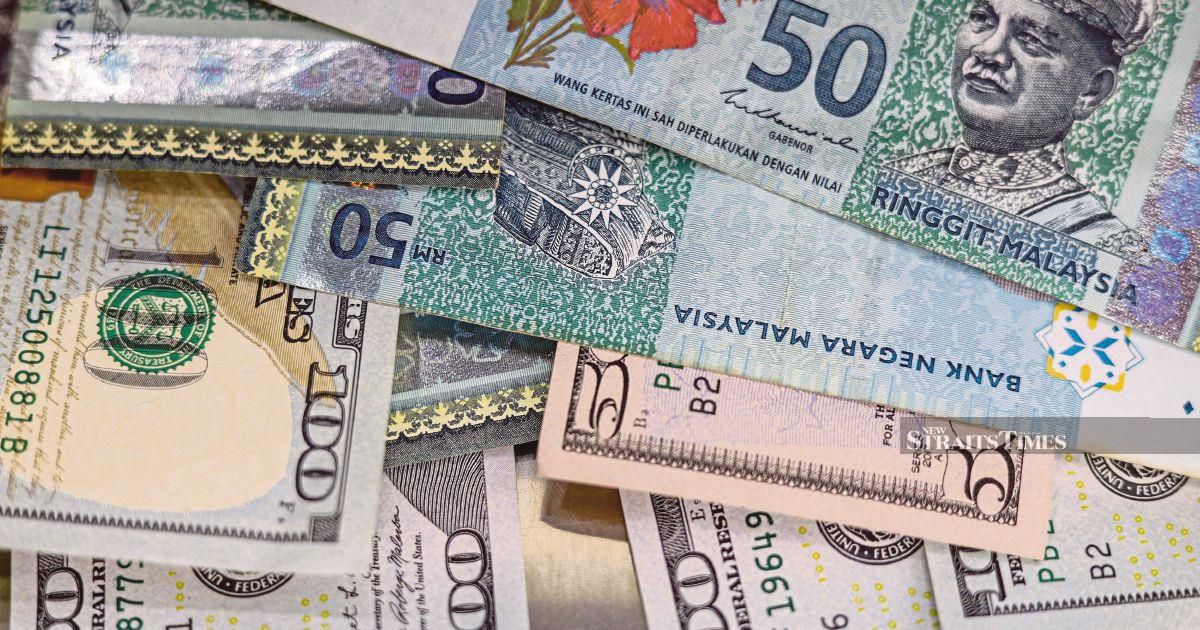 Ringgit ends marginally lower against US dollar ahead of US inflation data 1 eb35a92efbd401dd4187907bf48ce2e1db03f60ceb65eda42c1baaad00cc4d19